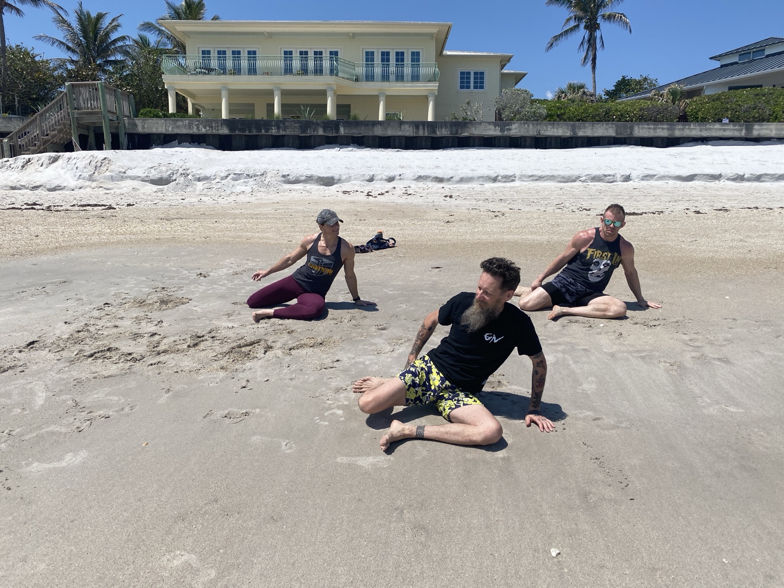 John leading a small Ginástica Natural group on the beach